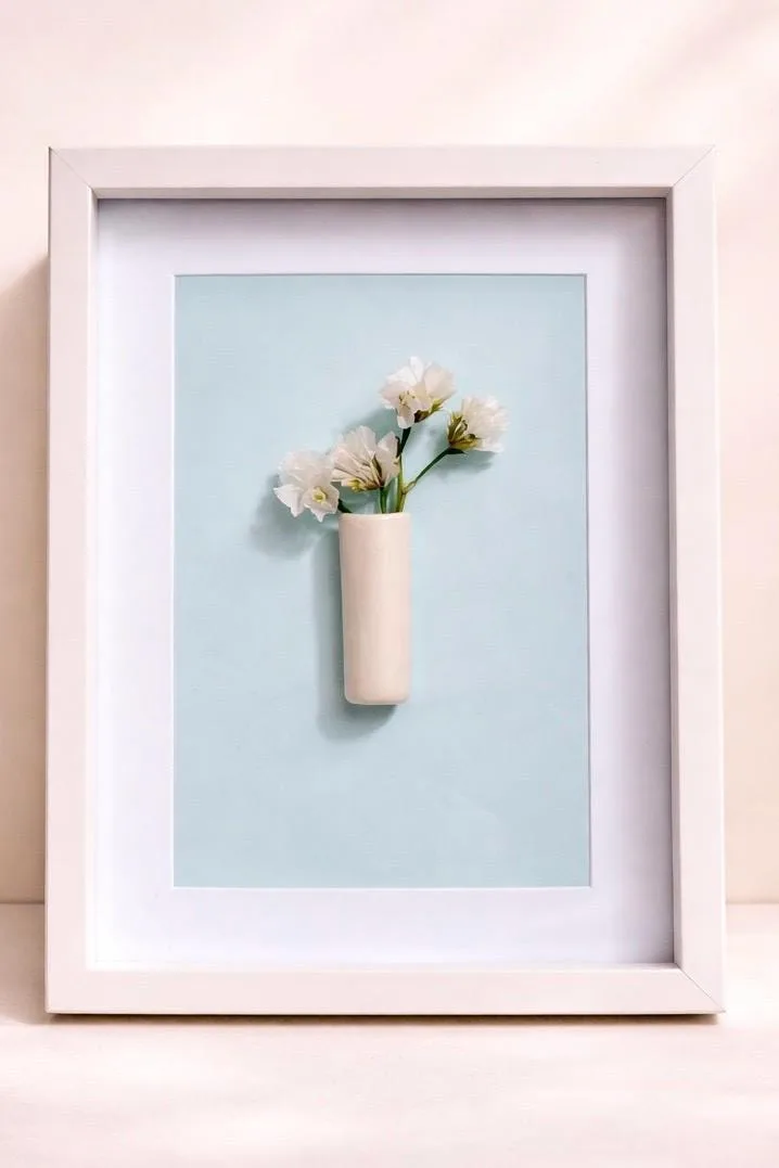 Framed cylindrical vase